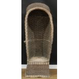 A wicker porter?s chair, carry handles to sides, 171cm high, 62cm wide, 57cm deep, the seat 42cm