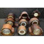 A collection of clocks including seven Art Deco mantel clocks, an American mantel clock, a clock