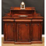 A William IV/early Victorian rosewood chiffonier or sideboard, shaped superstructure with