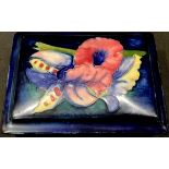 A Moorcroft Iris box and cover, 12cm wide