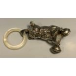 A silver baby's rattle, of a seated cat, with box, two bells, mother-of-pearl teething ring, 9cm
