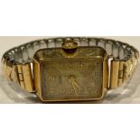 A lady's 9ct gold Rotary wristwatch , rectangular dial, Arabic numerals, the interior case marked