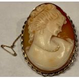 A 9ct gold mounted carved shell cameo pendant/brooch, a beauty in profile, safety chain, 5.5cm high,