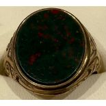 A late 19th century gentleman's 9ct rose gold bloodstone signet ring, size S/T, 5g