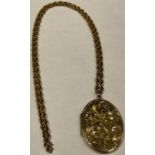 A 9ct gold necklace with 9ct gold pendant locket, 35cm drop, marked 375 and 9k, 27.6g
