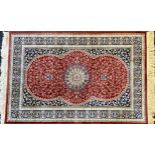A Persian style carpet, 100cm x 106cm