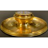 A French Art Nouveau enamelled brass oval ink stand, hinged cover, frosted glass liner, 20.5cm wide,