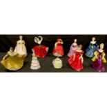 A Royal Doulton figure Loretta HN2337; others, Fragrance HN2334, Charlotte HN2421, Buttercup HN2399,