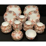 A late 19th/early 20th century Royal Crown Derby 3401 Imari pattern part tea service comprising cake