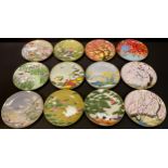 A set of twelve Japanese porcelain export ware collector's plates, The Seasons, transfer printed