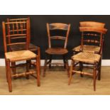Four 19th century rush seat side chairs; a beech and elm bar back side chair (5)