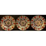 A set of three Royal Crown Derby Imari 1128 pattern dinner plates, 27cm diameter, printed marks,