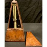 An early 20th century mahogany metronome