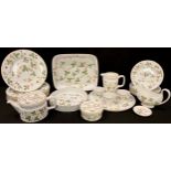 A Wedgwood Wild Strawberry pattern dinner and table ware service, including eight dinner plates,