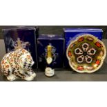 A Royal Crown Derby paperweight, Russian Bear, gold stopper, boxed; an 1128 pattern five petal tray,