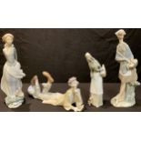A Lladro porcelain figure, Wind Blown, 35.5cm high; others, Girl with Basket; Girl with Bread Basket