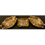 A pair of Royal Crown Derby 1128 Imari pattern shaped oval trinket dishes, solid gold band, first