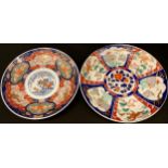 A large Japanese Imari charger, Meiji period, 39.5cm diameter; another similar, 36.5cm diameter (2)