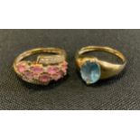A 9ct gold diamond and pink stone ring, stamped 9K 375 Qvc, size P, 2.8g gross; another blue topaz