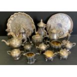 A Victorian silver plated EPBM three piece tea service; others later, trays, pair of candlesticks;