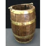 A coopered oak brass bound barrel bucket, 37cm high, 27.5cm diameter