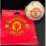 Sporting Interest - a signed Manchester United football, c.2000-2001; a Manchester United carrier
