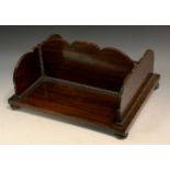 A George IV rosewood bookstand, shaped ends and division, bead-and-reel borders, bun feet, 37cm
