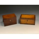 A 19th century mahogany rectangular tea caddy, the interior with two lidded compartments, loose ring