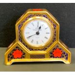 A Royal Crown Derby Old Imari clock with Quartz movement, 10cm high, 12.8cm wide