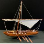 A model boat, single mast, fore point slide cannon, eight oars & Loops, 64,5cm high, 61cm long