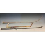 A 20th century horn hafted riding whip, 47cm long; others, leather plaited, 78cm long; C & J Zair