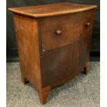 A George III style mahogany bow front commode chest, 67cm high x 60cm wide.