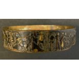 A 19th century bronze collar/ring, relief cast with Charioteers, Gladiators, Elephants and