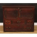 An 18th century oak mule chest, hinged rectangular top above an arrangement of four drawers, 90.