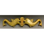 An Admiralty pattern brass Tiller Yoke, two opposing dolphins, spool inset tails, 54cm wide, c.1900