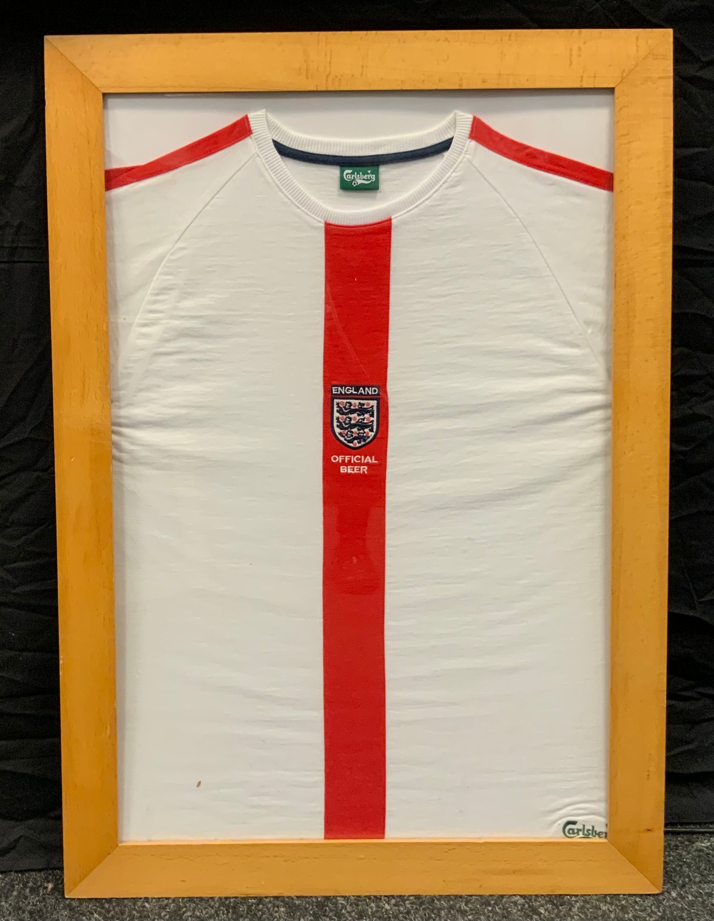 Sporting Memorabilia - an England Three Lions Football shirt, Calsberg label, 2006, framed