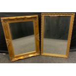 A rectangular gilt framed wall mirror, 98cm x 72cm; another 101cm x 66cm (2)