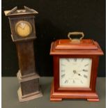 A miniature American longcase clock time piece, Arabic numerals, 40.5cm high, 10.7cm wide, 8.5cm