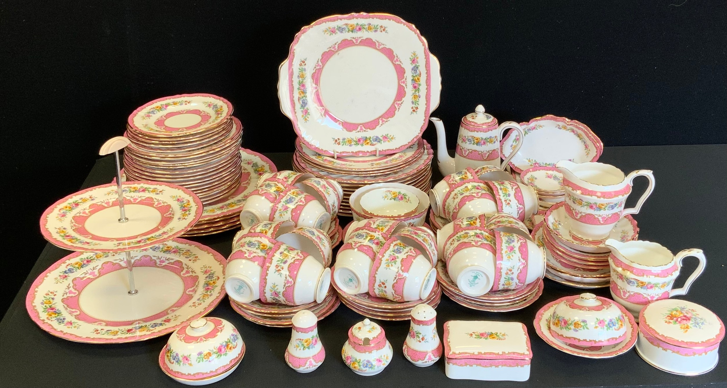 An extensive Royal Crown Staffordshire Pink Tunis pattern tea and dinner service, comprising five