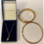 A 9ct gold necklace and pendant set with a clear glass stone, 1.4g; a 9ct rose gold bangle, marked