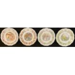 A set of four Royal Doulton Brambly Hedge shaped circular plates, the Four Seasons, 21cm diameter
