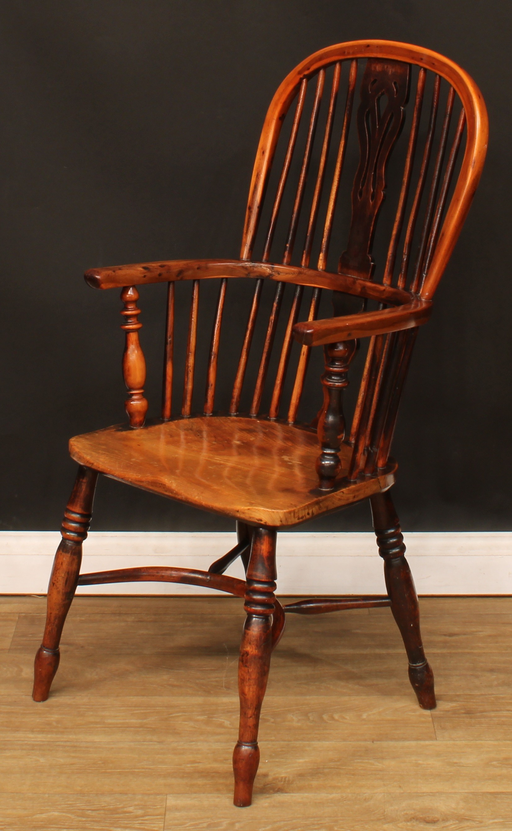 A 19th century yew and elm Windsor elbow chair, hoop back, shaped and pierced splat, one-piece mid- - Image 3 of 4