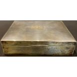 A silver cigarette box, inscribed 'Presented to Inspector W. J. Pike by the Magistrates Sitting at