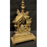 A 19th century gilt metal novelty pocket watch stand, cast as a bear bothering a bee hive