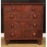 A Victorian simulated flame mahogany split chest, slightly oversailing top above two short and three
