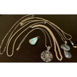 Jewellery - a collection of silver chains and pendants