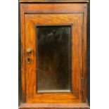 A Victorian oak country house letter box, rectangular top with post aperture, glazed door, 30cm