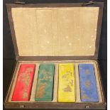 A set of four Japanese paint blocks, boxed