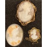 A Victorian gilt metal mounted cameo brooch; others similar (3)