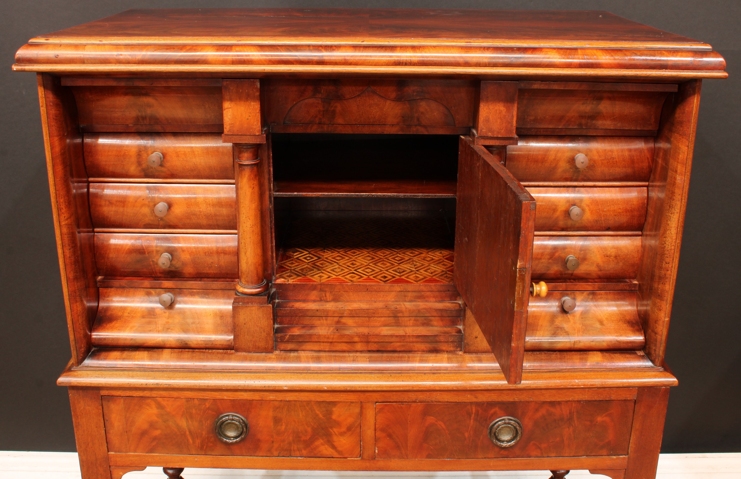 A Biedermeier flame mahogany architectural collector’s cabinet, rectangular top with convex- - Image 3 of 6